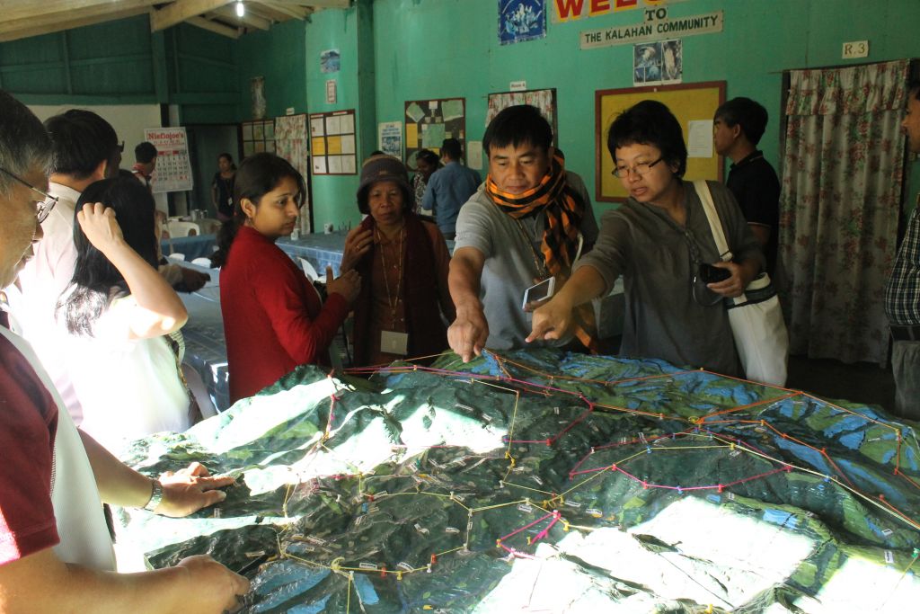 Participants discuss the principles of community forestry management 