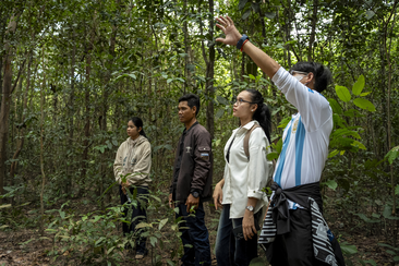 A group of youth volunteers from the “youth as guardians of the forest” project standing together