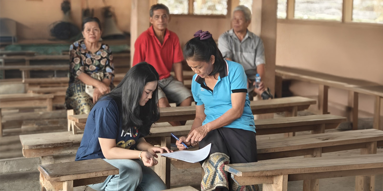 Lao youth guardians conducting interviews on forest fire