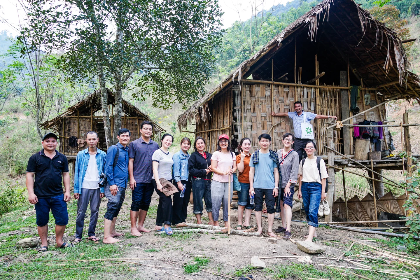 The Explore grant monitoring team in Tam Hop with local partners and government officials. 