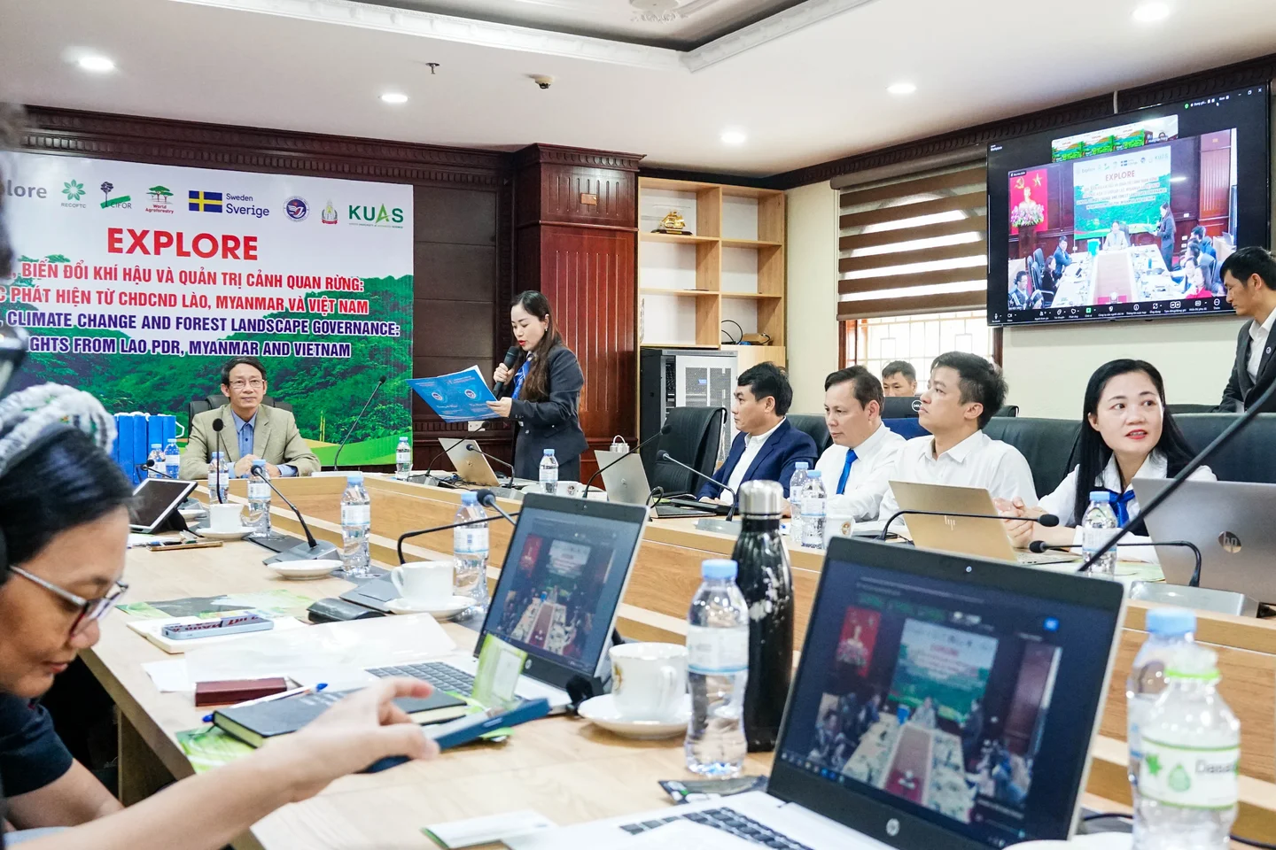 Ho Thi Phuonng (pictured speaking), lecturer and principal investigator at Vinh University, shares updates from her research project during a workshop at the Vinh University campus in Vinh City.