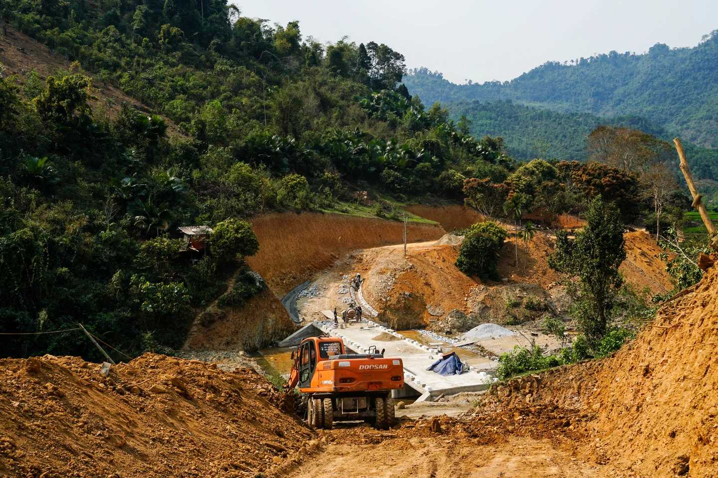 A new road being built south of the village will soon connect the white basil plantation site with Phong village.