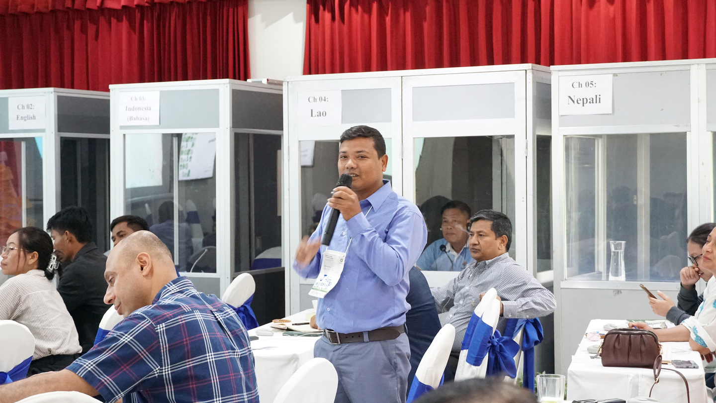 Individual booths (in the background) gave interpreters the isolation needed for accurate simultaneous translation.