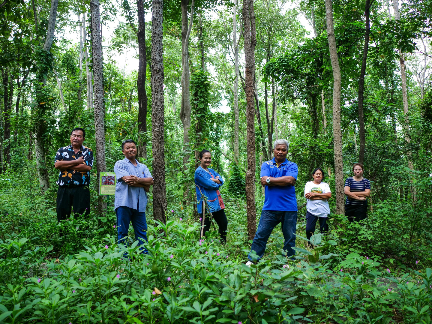 Community members stand in Ratchaburi Community Forest, western Thailand.