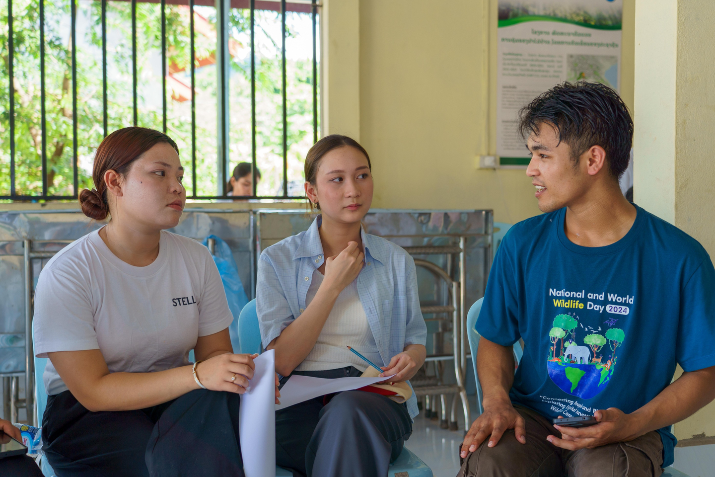Youth forest guardians in conversation.