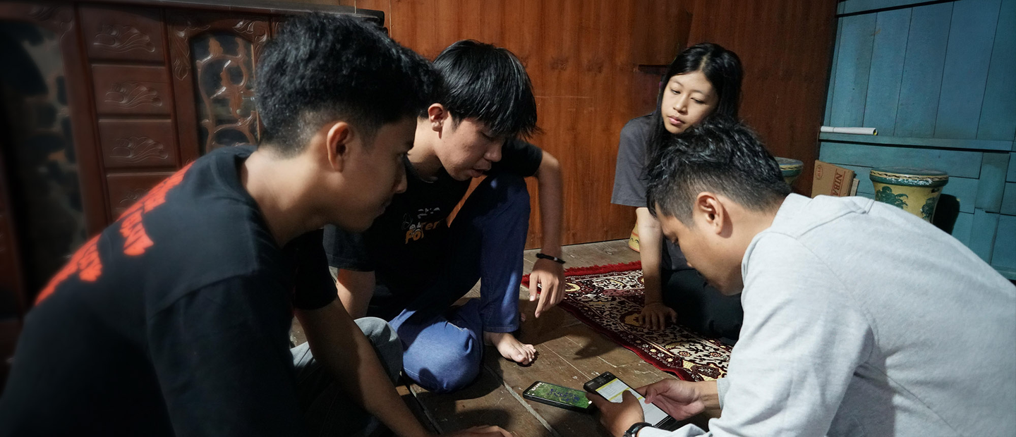 Students working on mobile device