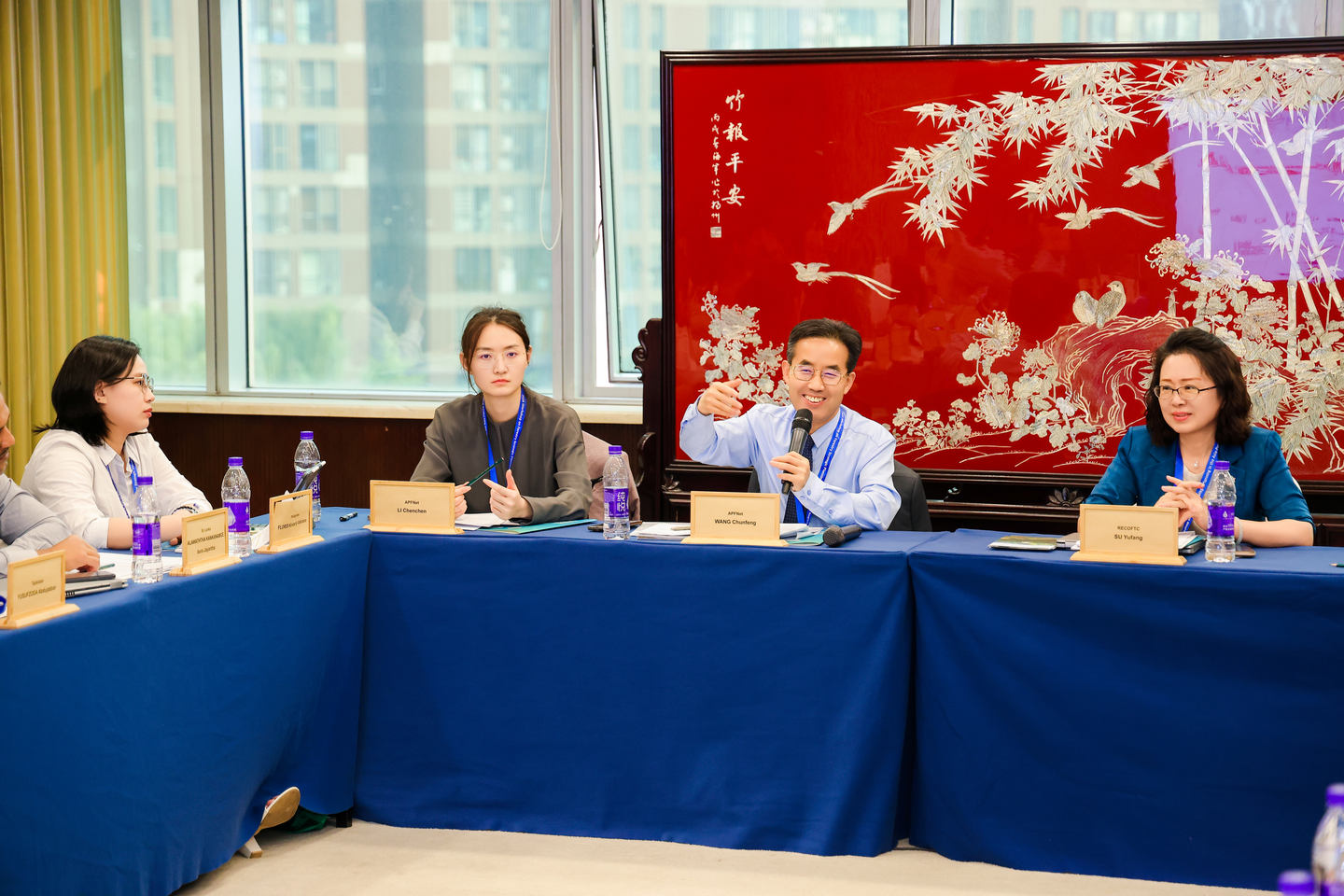Chunfeng Wang and Yufang Su deliver opening remarks.